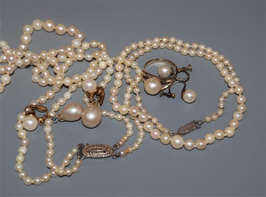 Two cultured pearl necklaces and a pair of cultured pearl ear-rings and one other simulated pair and a yellow metal and pearl ring